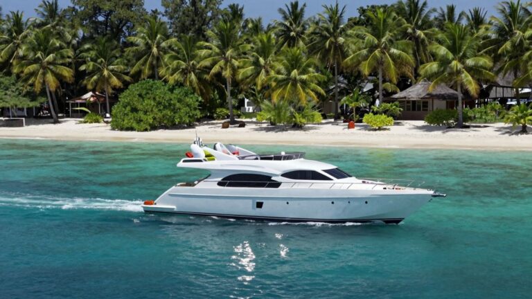 Yacht charter in Indonesia with tropical island backdrop.